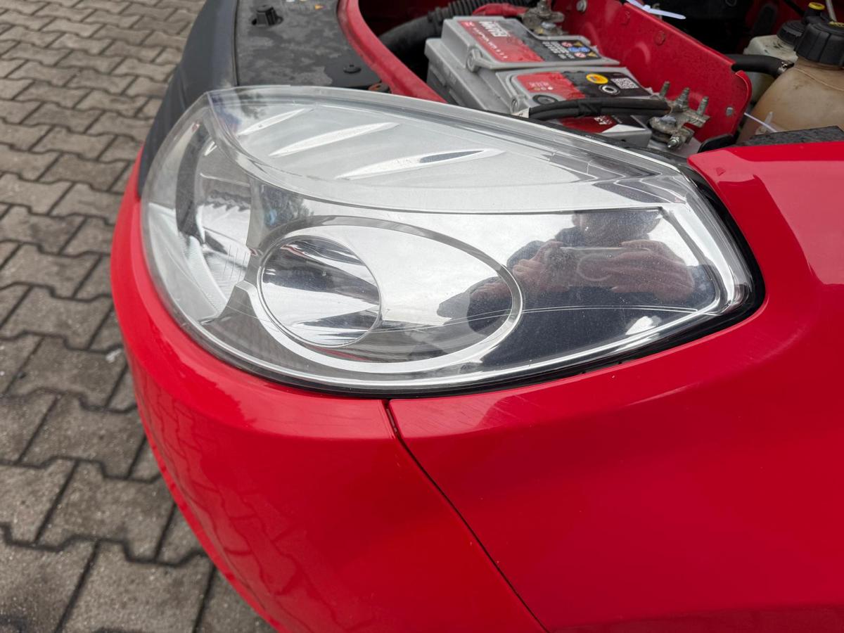 Dacia Sandero SD original Scheinwerfer links Halogen BJ09